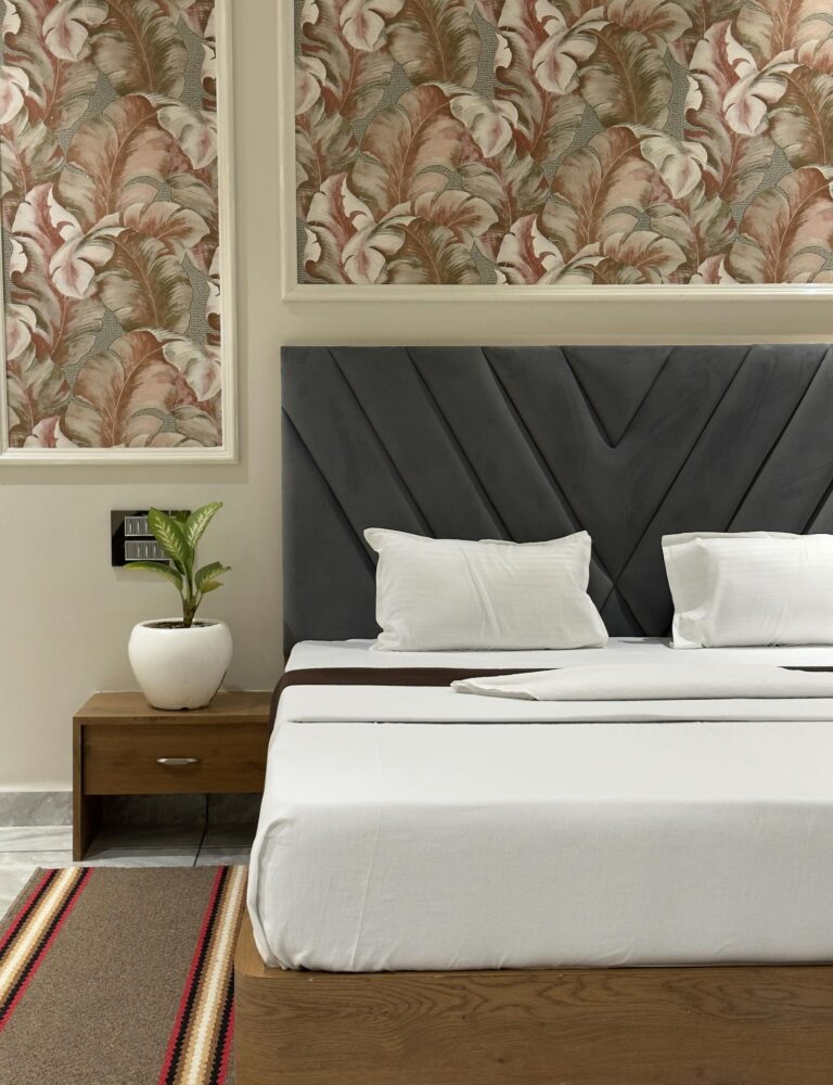 Hotel Room with Patterned Wallpaper